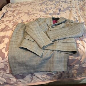 Beautiful business attire pinstriped w lined jacket.